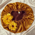 Bonnet en satin doré et marron Asantewaa
